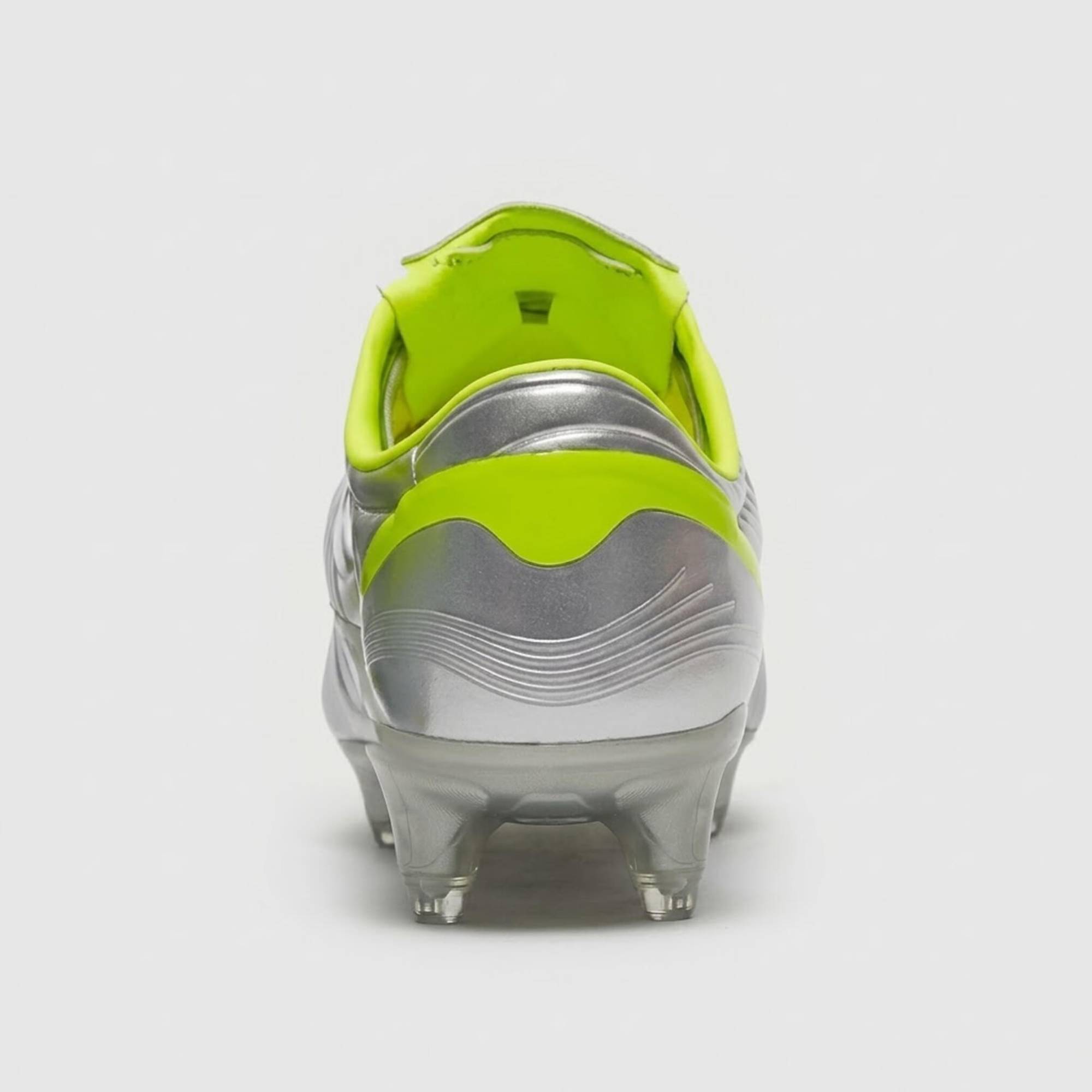 The boot from behind, a lime band across its chrome heel